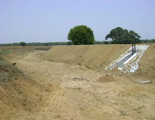 Rehabilitated tank bund and water-control structure